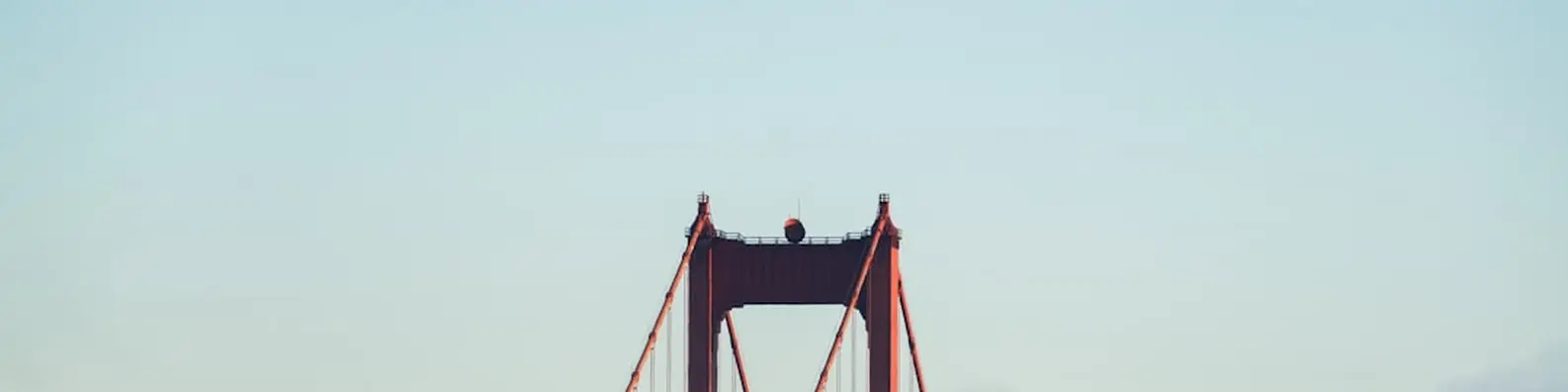 red concrete bridge sky banner